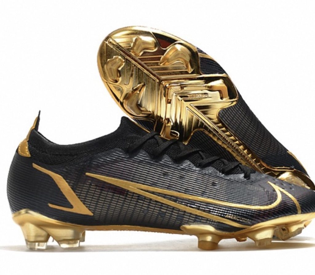 black and gold soccer cleats